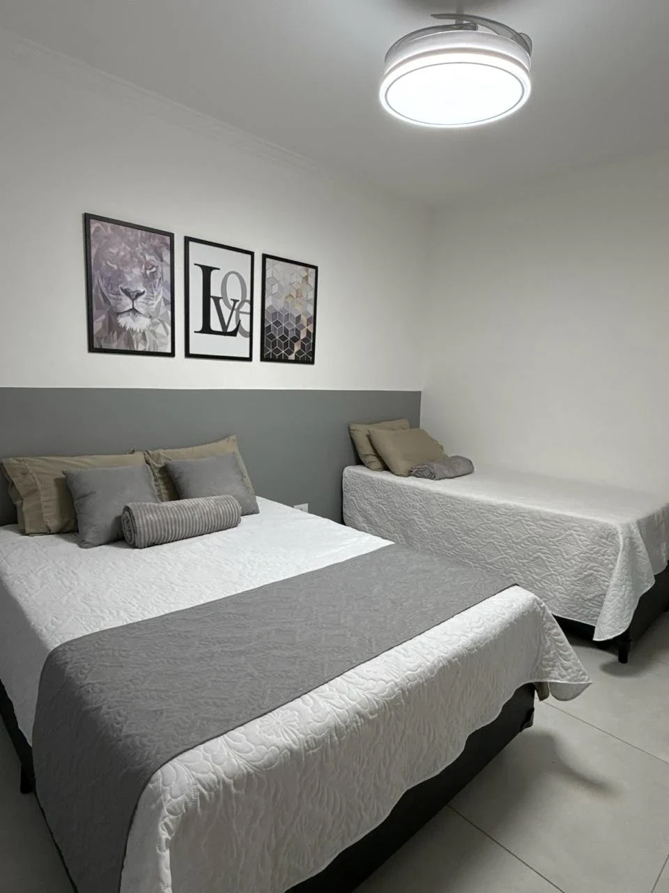 Double and single beds, beachfront apartment in Praia Grande